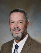 Photograph of speaker. 