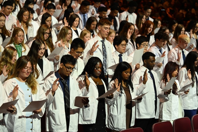 PharmD students reciting the Oath of a Pharmacist at the White Coat Ceremony 2026. 