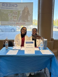 PharmD students volunteering at Tops service-learning vaccine education event. 